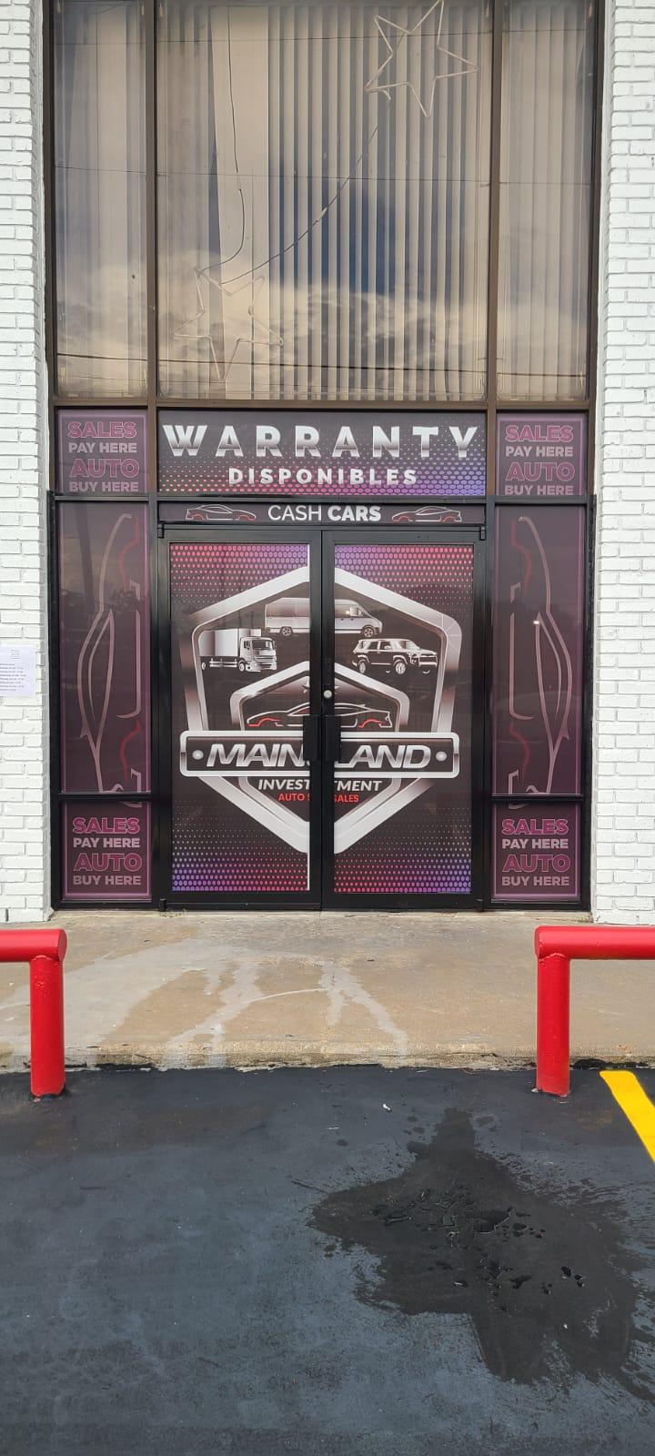 Perforated storefront window wrap on glass