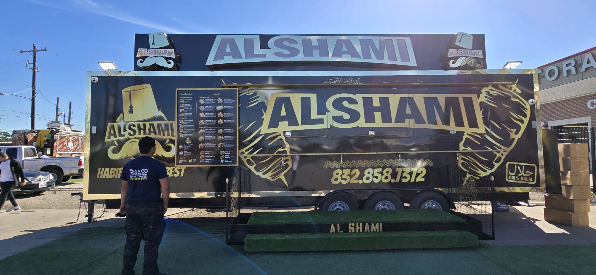 Full food truck wrap inside the shop