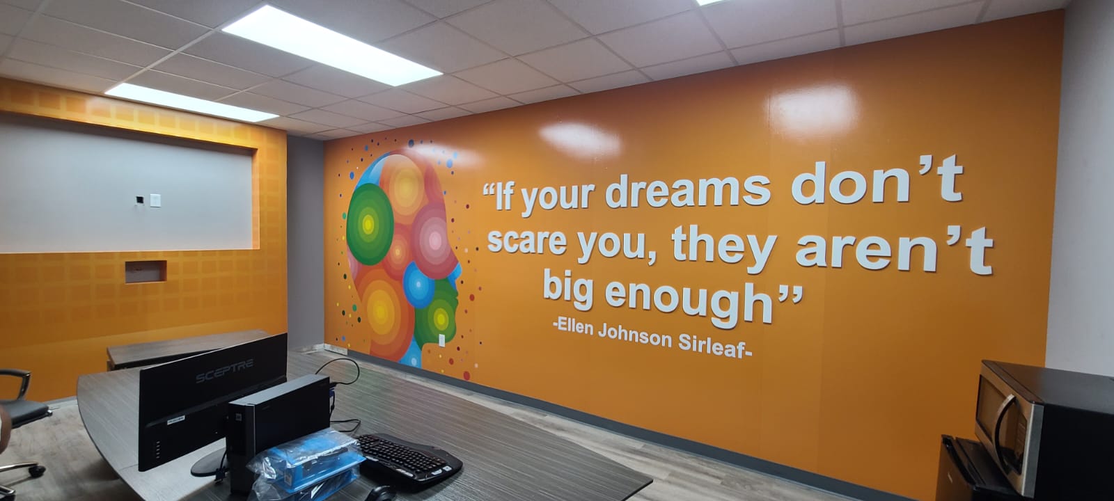 Indoor wall wrap and dimensional quote graphic