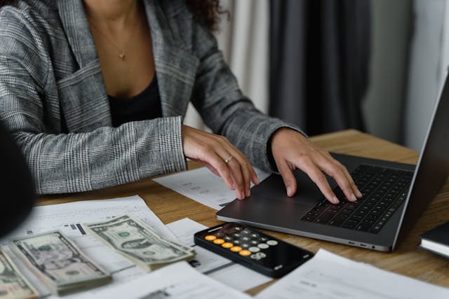 A woman working on a laptop