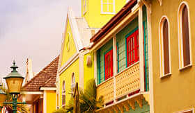 Carnival Cruise Lines bright colorful buildings in a Caribbean city