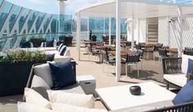 Lounge chairs on The Retreat Sundeck aboard Celebrity Millennium