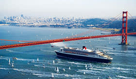 Cunard Line Queen Mary 2 sailing under San Francisco bridge