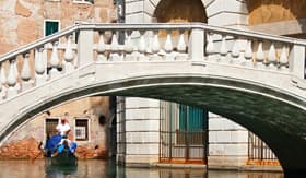 Europe Cruisetours Gondola ride towards bridge in Venice,Italy