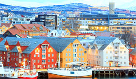 Holland America Line view of Tromso cityscape at dusk Norway