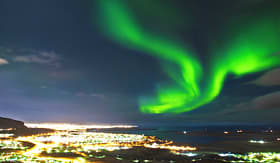 Norwegian Cruise Line Northern Lights above Reykjavik, Iceland