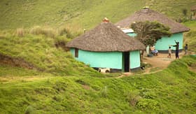 Princess Cruises rural huts in South Africa with children playing