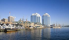 Regent Seven Seas Cruises ships docked in the early morning on Halifaxs waterfront at Purdys Wharf