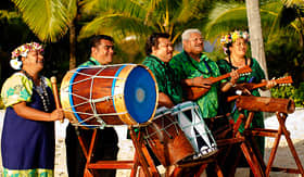 Royal Caribbean polynesian band with drums and ukeleles