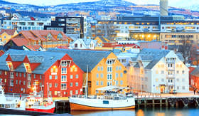 Seabourn aerial view of Tromso cityscape at dusk Norway