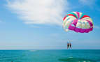 Parasailing tropical waters Southern Caribbean