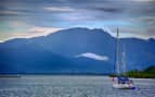 sailboat leaving Port Denarau Fiji Carnival Cruise