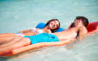 Couple in the water Celebrity Cruises Bahamas