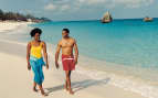 Couple strolling along the beach