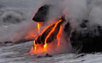 Volcano lava flows into the sea