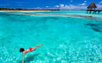 Enjoying a swim in the clear waters of Tahiti