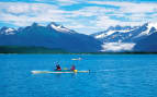 Guests kayaking through Juneau, Alaska