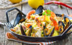 Tasty Spanish paella with seafood and chicken