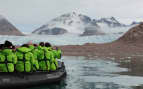 Atlas Ocean Voyages guests in- their Arctic parkas