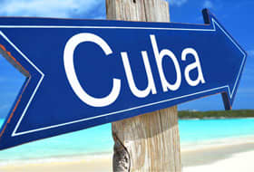 Sign pointing to Cuba