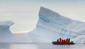 Zodiac trolling Antarctica for a landing spot