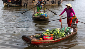 Local selling fruit on the Mekong River