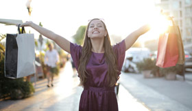 Girl with shopping bags on Celebration Key