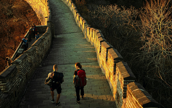 Couple walking on Great Wall of China