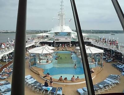 Pool deck with movie screen on the Grandeur of the Seas Pool deck with movie screen on the Grandeur of the Seas