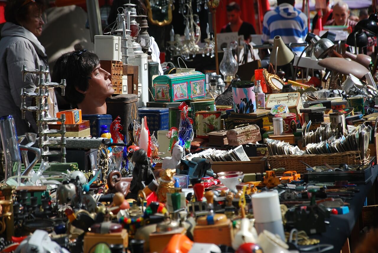 image of cluttered tables at a flea market