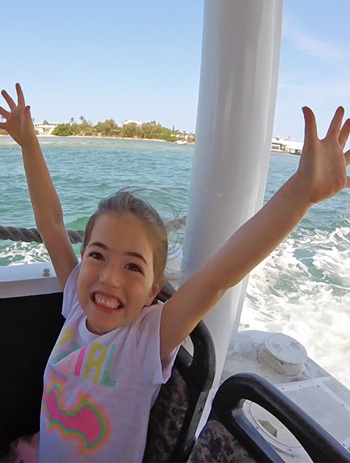 Girl Having Fun on Duck Bus