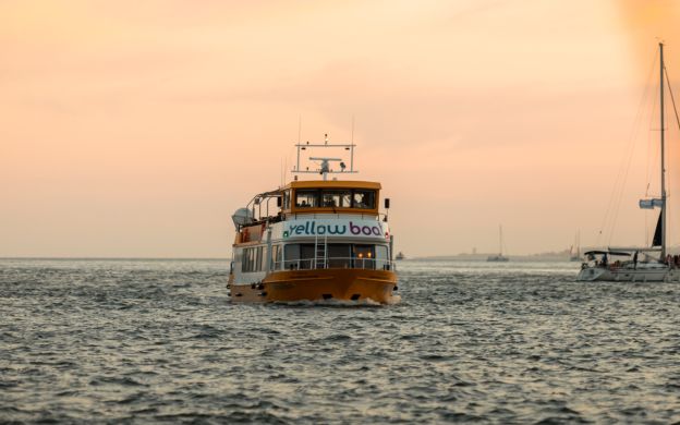 yellow boat sunset tour