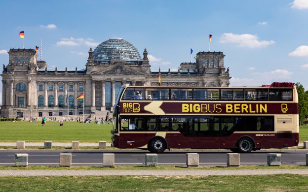 Dynamic Big Bus Berlin gracefully gliding through the streets of Berlin, offering a captivating city tour experience.