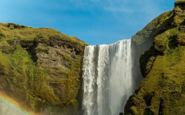 Majestic waterfall in Reykjavik, Iceland, showcasing the natural beauty and enchanting allure of this picturesque destination.