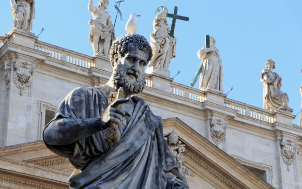 A close-up camera captures a stunning statue at Saint Peter's Square, an iconic landmark in the beautiful Vatican City.