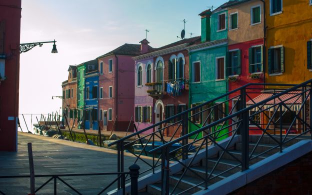 Vibrant capture of Burano, Murano, and Torcello Islands, showcasing their colorful charm and unique allure in a bright image.
