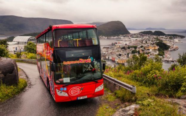 City Sightseeing Ålesund: Hop-On, Hop-Off Bus gracefully reveals the city's beauty, offering passengers an immersive exploration experience.