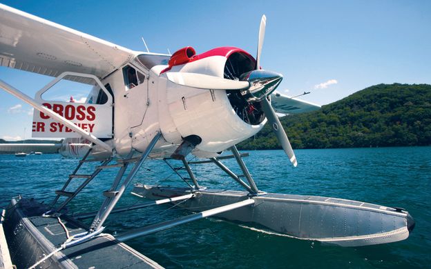 A seaplane poised for takeoff, its wings gleaming in anticipation, as it prepares to embark on a skyward adventure.