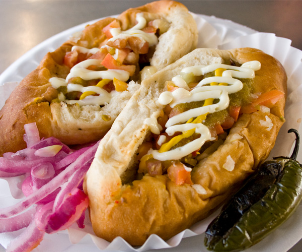 Two Sonoran-style hot dogs from El Guero Canelo restaurant
