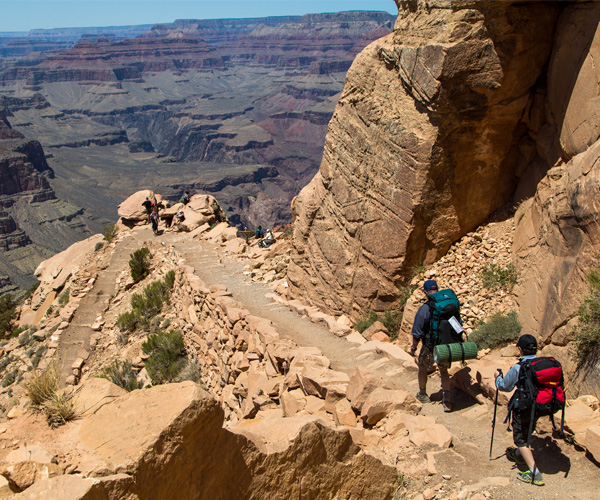 Hikers descend the South Kaibab Trail in the Grand Canyon