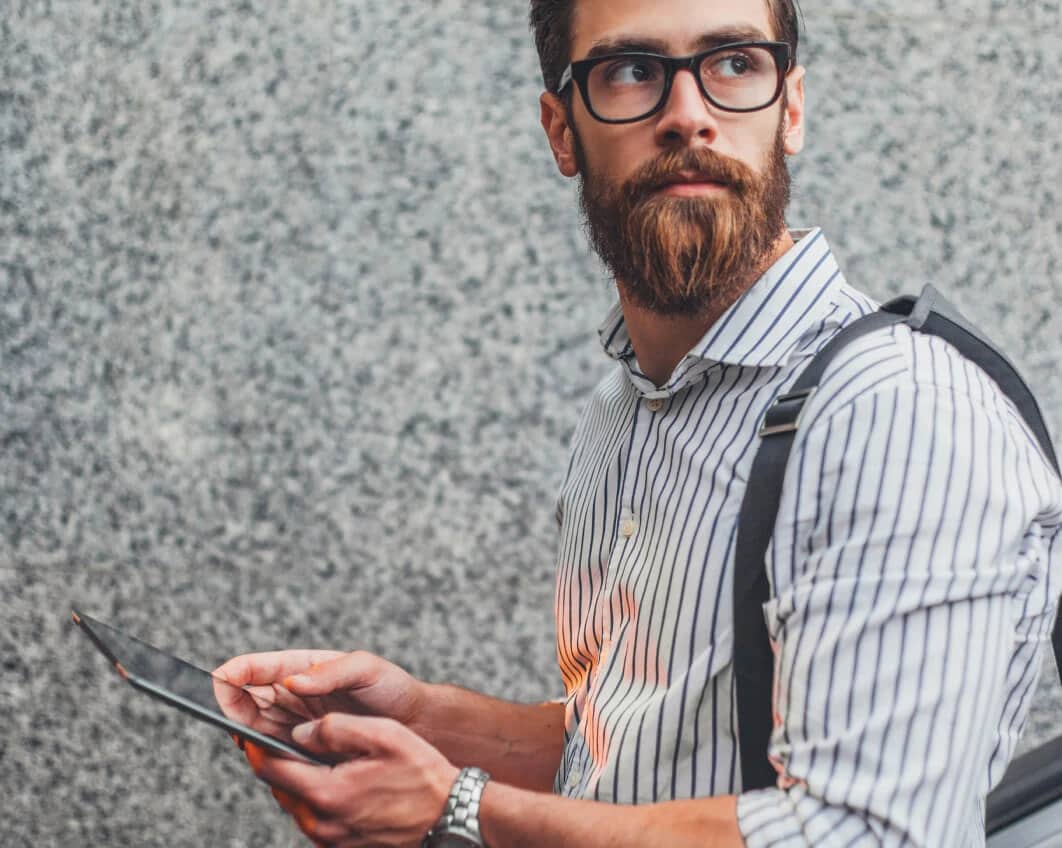 Man with a tablet device