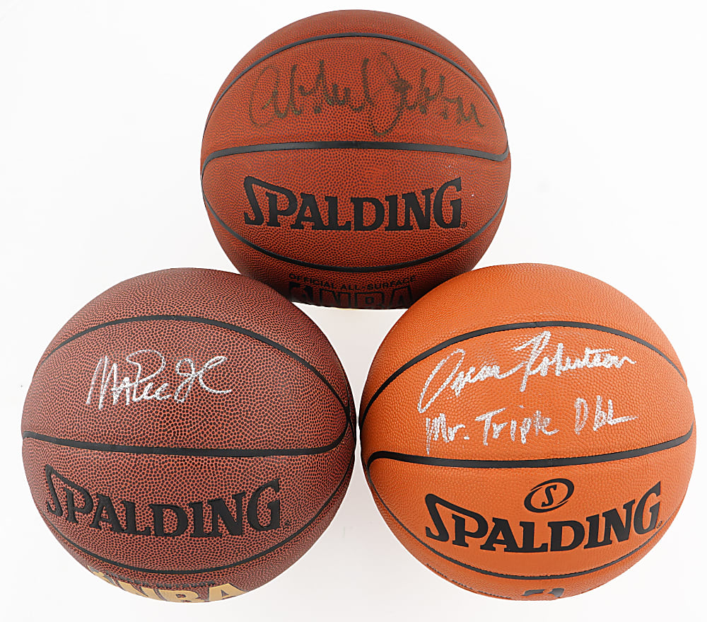 Kareem Abdul-Jabbar, Magic Johnson, and Oscar Robertson Single-Signed Basketball Trio - All PSA/DNA