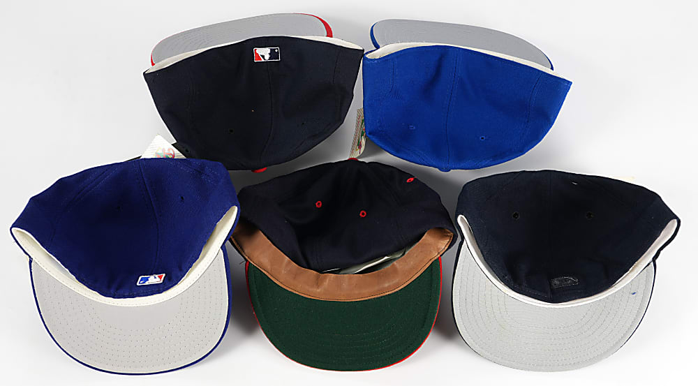 Nolan Ryan Signed Cap Quintet featuring Each Team from Career