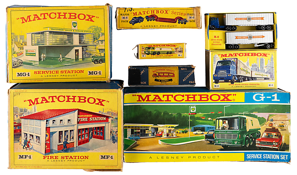 1950s-1960s Matchbox A, G and M Series Collection (16) in Original Factory Boxes with MF-1 Fire Station, MG-1 Service Station & M-9 Inter-State Double Freighter
