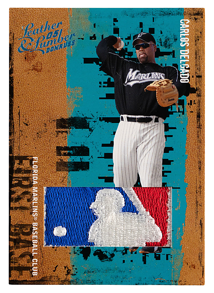 2005 Donruss Leather & Lumber #24 Carlos Delgado MLB Logoman Patch #1/2