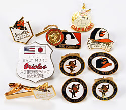 1966-1983 Baltimore Orioles World Series Press Pins/Cuff Links/ Tie Clips Collection (9) with Complete Run & Rare 1971 Tour of Japan Badge
