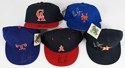 Nolan Ryan Signed Cap Quintet featuring Each Team from Career