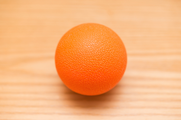 Orange massage ball for self-massage