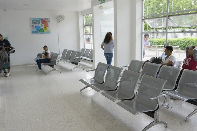 An empty waiting room with chairs, a quiet moment of anticipation