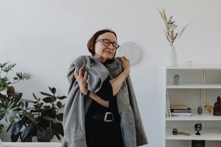 A woman resting calmly in a comfortable modern living space